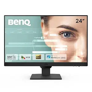 BenQ monitor with a woman's face on the screen displaying product features.