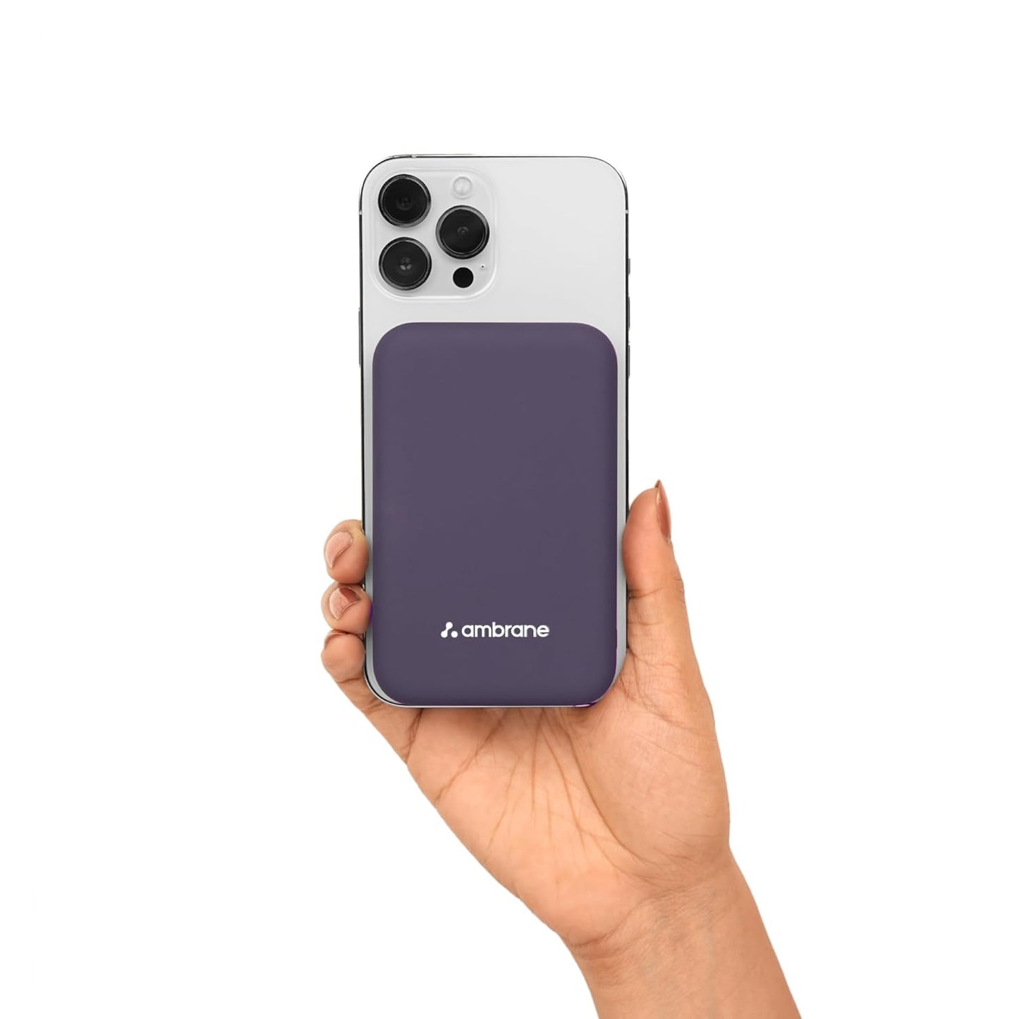 Hand holding a smartphone with a purple case featuring the Ambrane logo on a white background