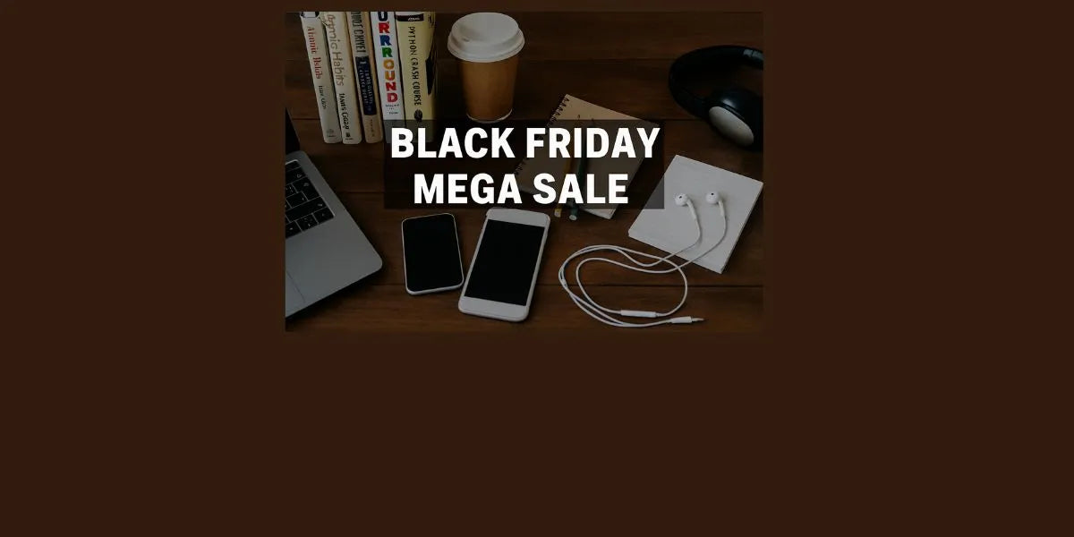 Table with electronic devices and 'Black Friday Mega Sale' text